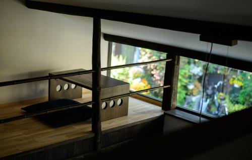 a view of a room with a balcony with a window at Shiki Homes TSURU KAME in Kyoto