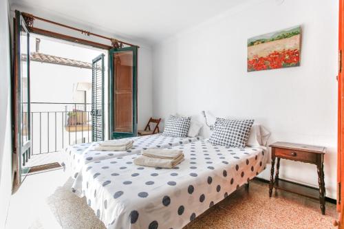 Ένα ή περισσότερα κρεβάτια σε δωμάτιο στο El Niu