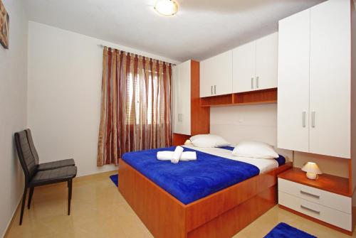 En eller flere senge i et værelse på Vila Nova with private heating pool and jacuzzi