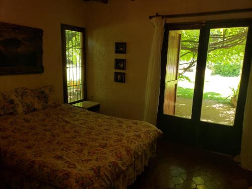 Postel nebo postele na pokoji v ubytování Casa Vistalba 220 dolarblue B La Capilla