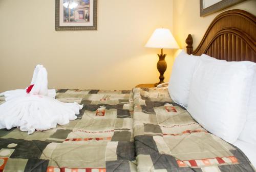Katil atau katil-katil dalam bilik di Villas at Fortune Place