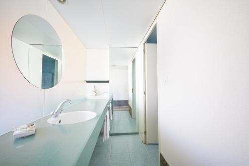 Un baño de Hotel City am Bahnhof
