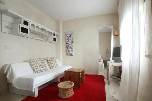 Postel nebo postele na pokoji v ubytování Apartamentos Caravane