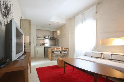 Kuchyň nebo kuchyňský kout v ubytování Apartamentos Caravane