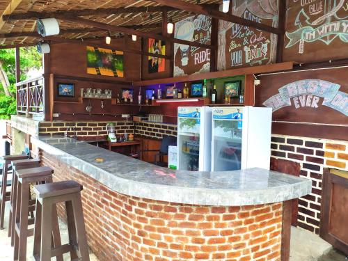 The lounge or bar area at MC Padi Dive Resort