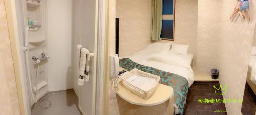 Kúpeľňa v ubytovaní Nishifunabashi Ekimae Hotel