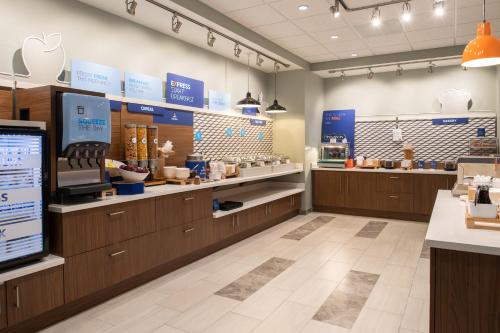 a store with wooden counters and aasteryasteryasteryasteryasteryasteryasteryasteryastery at Holiday Inn Express & Suites - Camas by IHG in Camas
