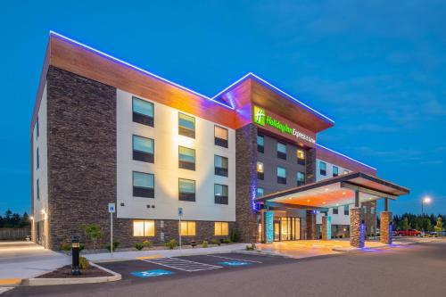 a rendering of a hotel with a gas station at Holiday Inn Express & Suites - Camas by IHG in Camas