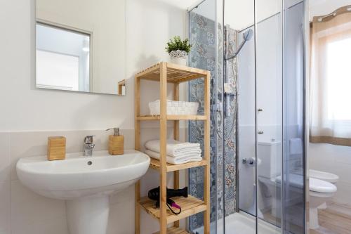 Kúpeľňa v ubytovaní Centre Apartment Grotte Bianche