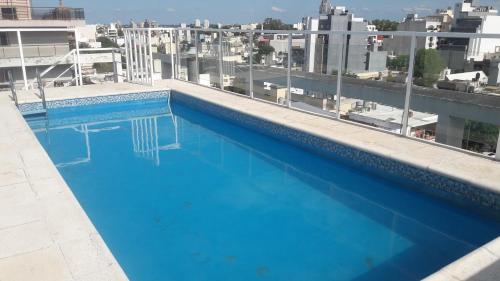 Bazén v ubytování DPTO ALTA CORDOBA nebo v jeho okolí