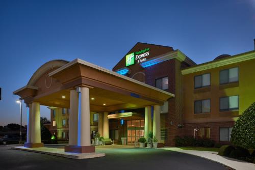 a hotel building with a gazebo in front of it at Holiday Inn Express Hotel & Suites Anniston/Oxford by IHG in Oxford