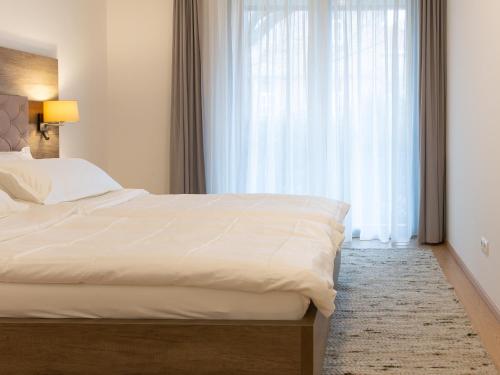 Postel nebo postele na pokoji v ubytování Premium Green Apartments Vienna