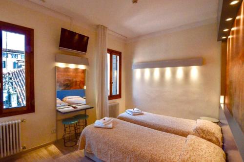 Katil atau katil-katil dalam bilik di Locanda Silva