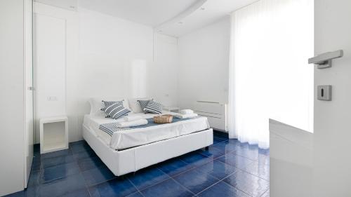 Katil atau katil-katil dalam bilik di Rivazzurra Homes - B