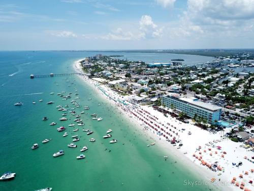 an aerial view of a beach with boats in the water at Lani Kai Island Resort in Fort Myers Beach