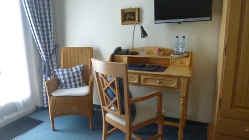 Μια τηλεόραση ή/και κέντρο ψυχαγωγίας στο Hotel Landhaus Apartments