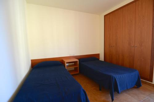 Posteľ alebo postele v izbe v ubytovaní MIAMI II 102