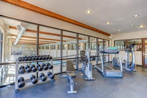 a gym with several treadmills and exercise equipment at Holiday Inn Express Hotel & Suites Montrose - Townsend, an IHG Hotel in Montrose