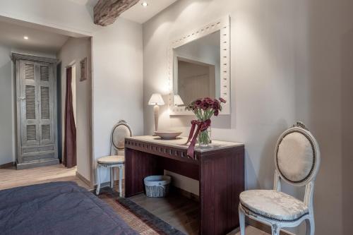 Postel nebo postele na pokoji v ubytování Auberge l'Entrecôte