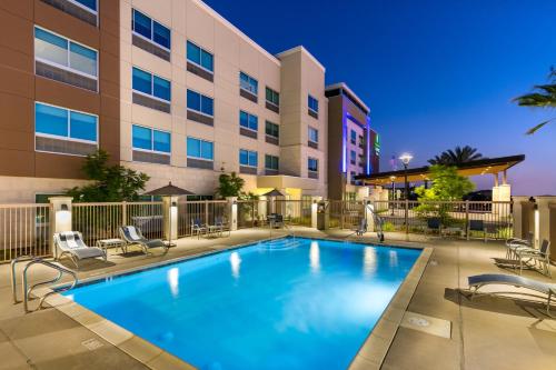 an image of a pool at a hotel at Holiday Inn Express & Suites - Moreno Valley - Riverside by IHG in Moreno Valley