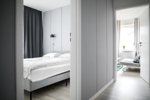 Posteľ alebo postele v izbe v ubytovaní Apartament Nadbystrzycka no.14