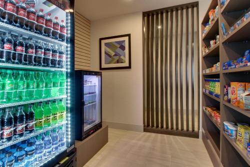 a drink refrigerator in a store with soda bottles at Holiday Inn Express & Suites Mt Sterling North by IHG in Mount Sterling