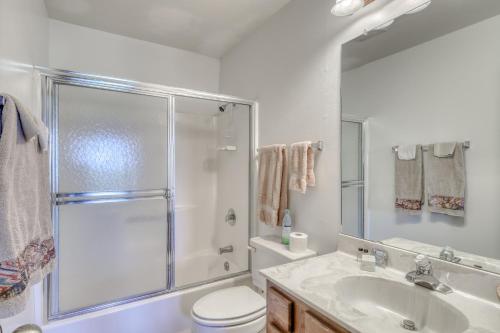a bathroom with a shower and a toilet and a sink at Ski Run C8 in Angel Fire