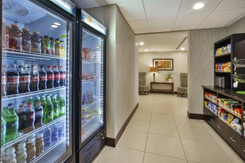a refrigerator filled with lots of soda at Holiday Inn Express & Suites Geneva Finger Lakes by IHG in Geneva