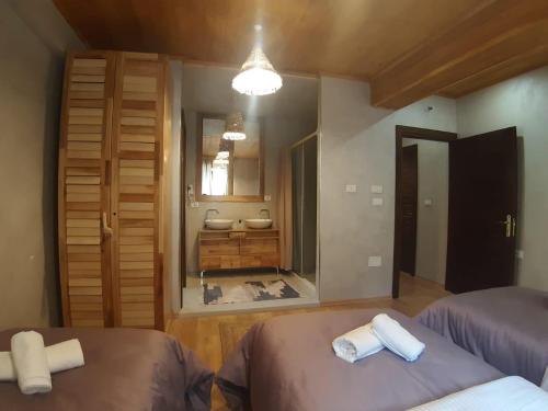 Postel nebo postele na pokoji v ubytování Hotel Restaurant Alpet Theth