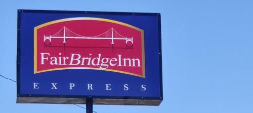 a sign for a fair bridge inn express at FairBridge Inn Express Stuttgart in Stuttgart
