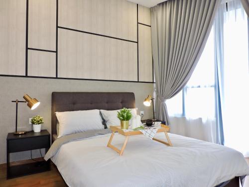 Cama o camas de una habitación en Gaia Residence, Gamuda Gardens Rawang by Sleepy Bear