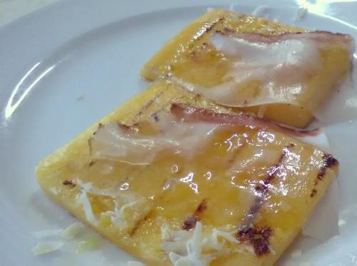 two pieces of food on a white plate at Hotel Ristorante Stella in Palestrina