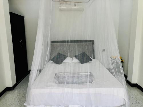 Cama o camas de una habitación en Siri's Residency