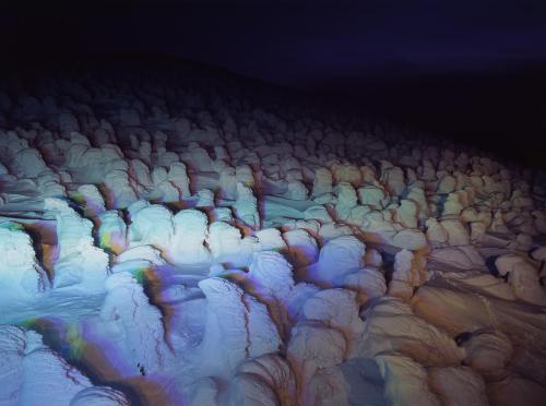 an aerial view of glaciers and snow covered mountains at Meitoya So in Zao Onsen