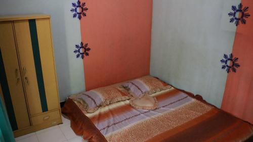 Postel nebo postele na pokoji v ubytování Homestay ENDRO