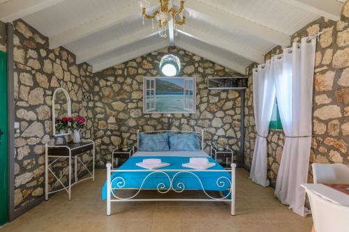 Krevet ili kreveti u jedinici u objektu Sofias cottage Razata Argostoli