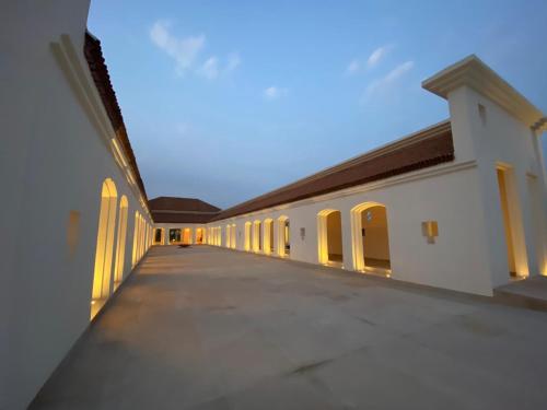 an empty hallway of a building at dusk at Marasa Sarovar Premiere, Bodhgaya in Bodh Gaya