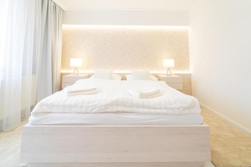 Postel nebo postele na pokoji v ubytování Hotel Artin