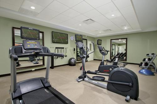 a gym with several exercise bikes in a room at Staybridge Suites - Houston - Medical Center by IHG in Houston