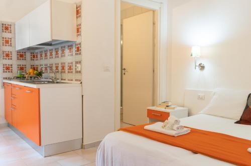 Katil atau katil-katil dalam bilik di Agriturismo Costantino