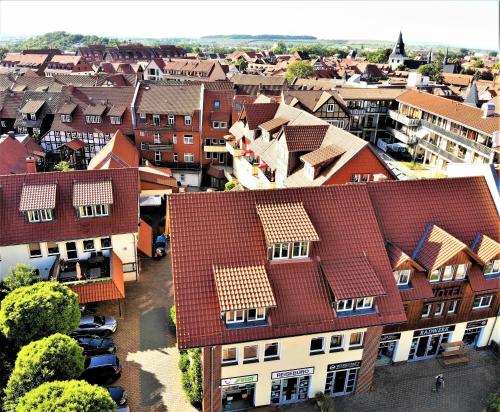an overhead view of a city with houses and cars at Apart Hotel Wernigerode in Wernigerode