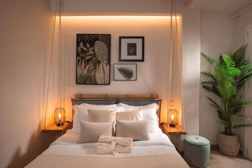 Posteľ alebo postele v izbe v ubytovaní Palm Luxury Studios