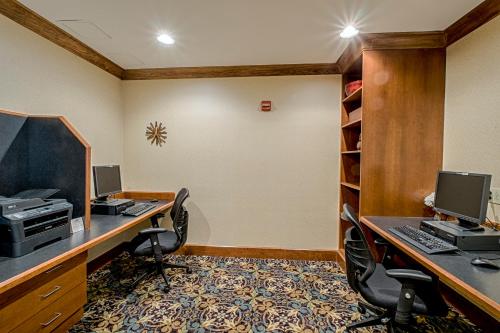 an office with two desks and two computer monitors at Staybridge Suites Harrisburg-Hershey, an IHG Hotel in Harrisburg