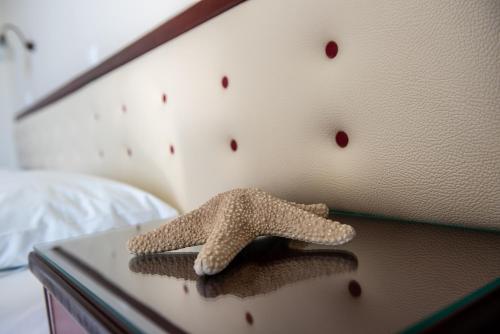 Dionisos Hotelにあるベッド