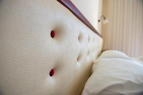 Dionisos Hotelにあるベッド