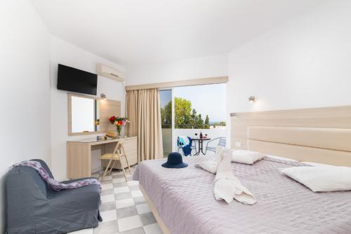 Postel nebo postele na pokoji v ubytování Sabina Hotel