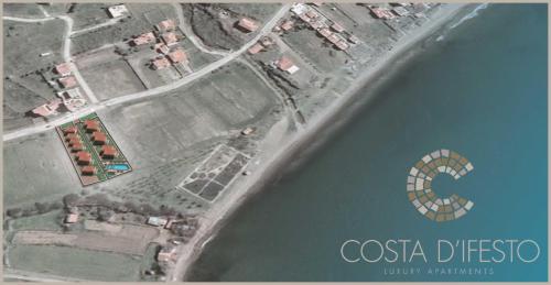 an overhead view of the ocean with the cecilia digsis logo at Costa D' Ifesto in Agios Ioannis Kaspaka