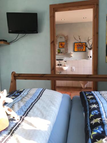 Postel nebo postele na pokoji v ubytování Waldhotel Auerhahn "Hochkopfhaus"