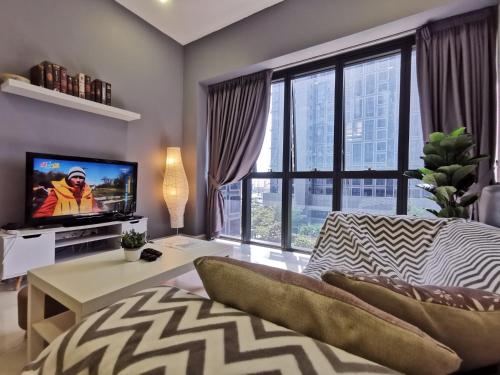 Μια τηλεόραση ή/και κέντρο ψυχαγωγίας στο Charming Suite & Sunway and Petaling Jaya