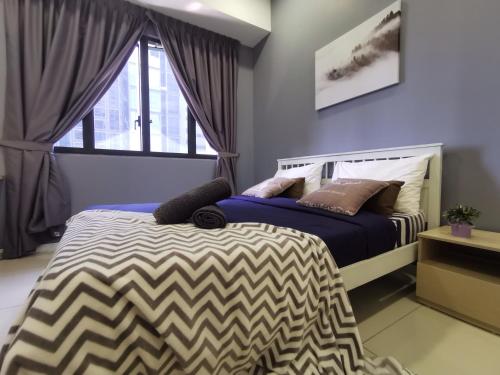 Ένα ή περισσότερα κρεβάτια σε δωμάτιο στο Charming Suite & Sunway and Petaling Jaya